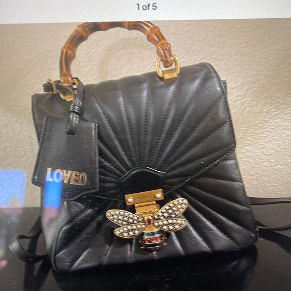 GUCCI BLK, Bk Pk with strap to wear on shoulder, Pearl bee clasp $3,150 now$1164